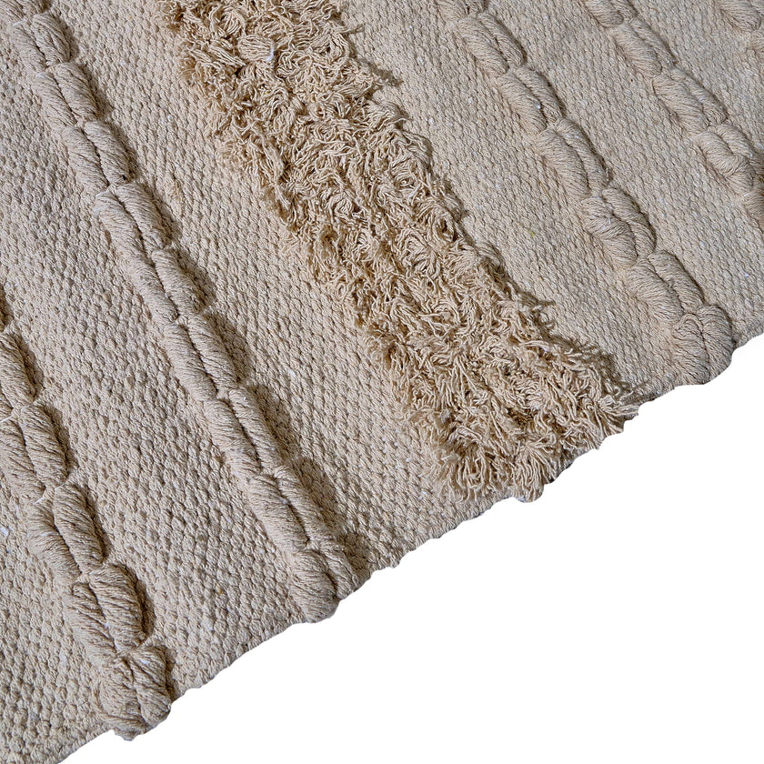 kilim in cream cotton with textured stripe motif, demonstrating kilim craftsmanship.