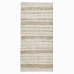 kilim in cream cotton with textured stripe motif, demonstrating kilim craftsmanship.