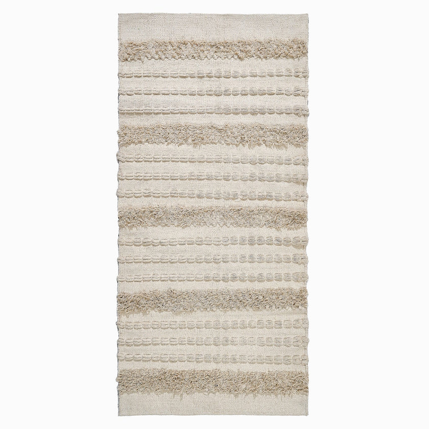kilim in cream cotton with textured stripe motif, demonstrating kilim craftsmanship.