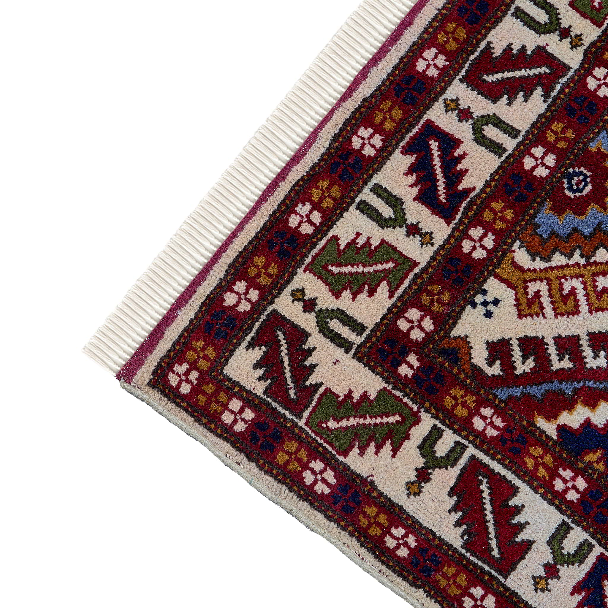 rug in red wool with geometric lattice motif, demonstrating handwoven rug craftsmanship.