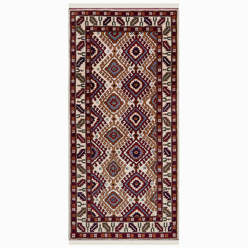 rug in red wool with geometric lattice motif, demonstrating handwoven rug craftsmanship.