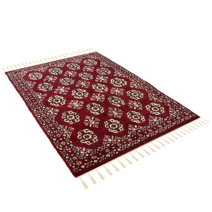 rug in deep red wool with rosette field motif, demonstrating kilim craftsmanship.