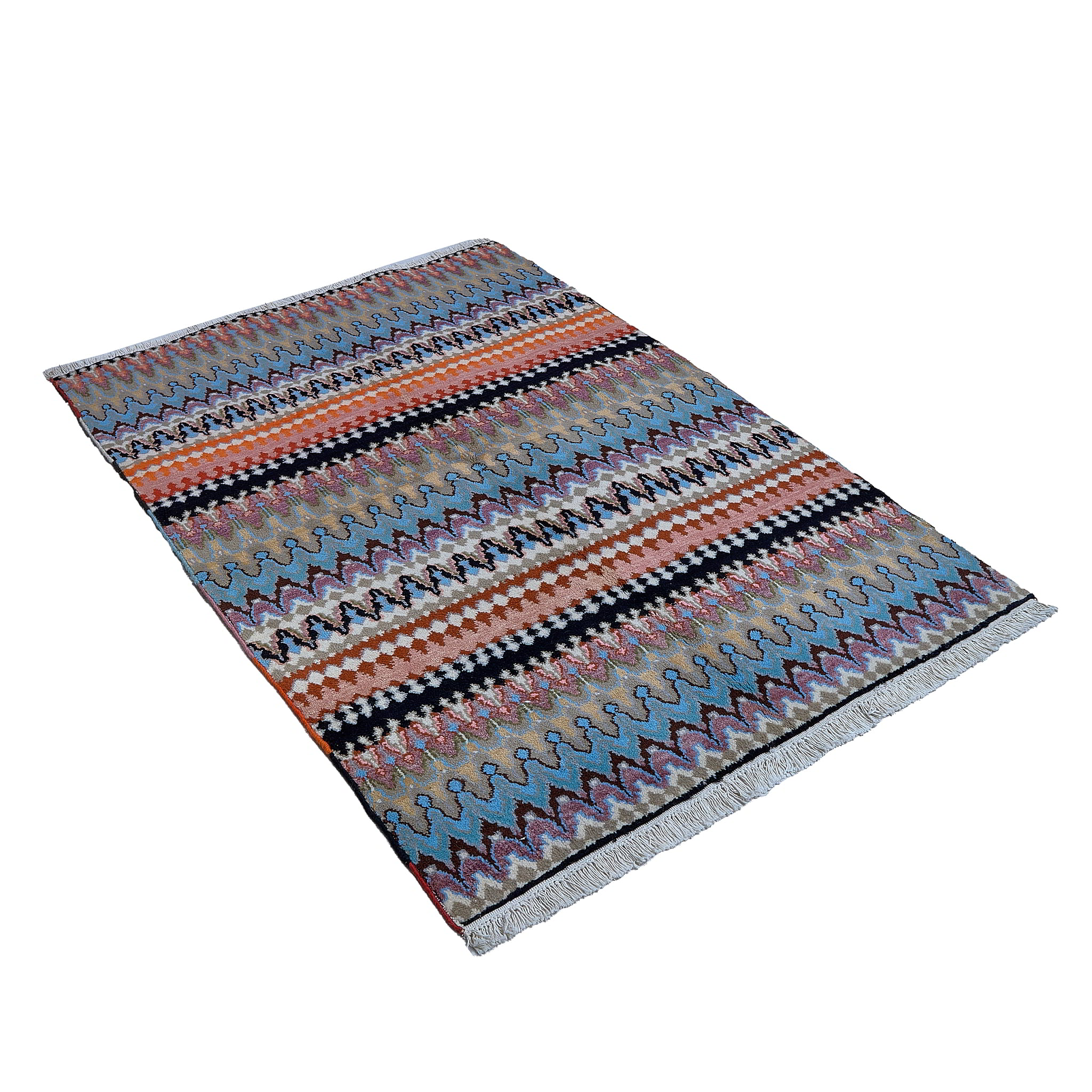rug in blue wool with zigzag tribal stripe motif, demonstrating handwoven rug craftsmanship.