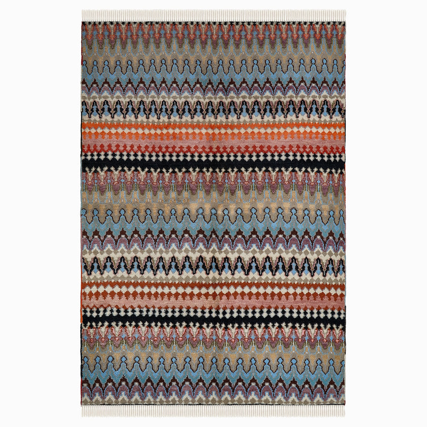 rug in blue wool with zigzag tribal stripe motif, demonstrating handwoven rug craftsmanship.