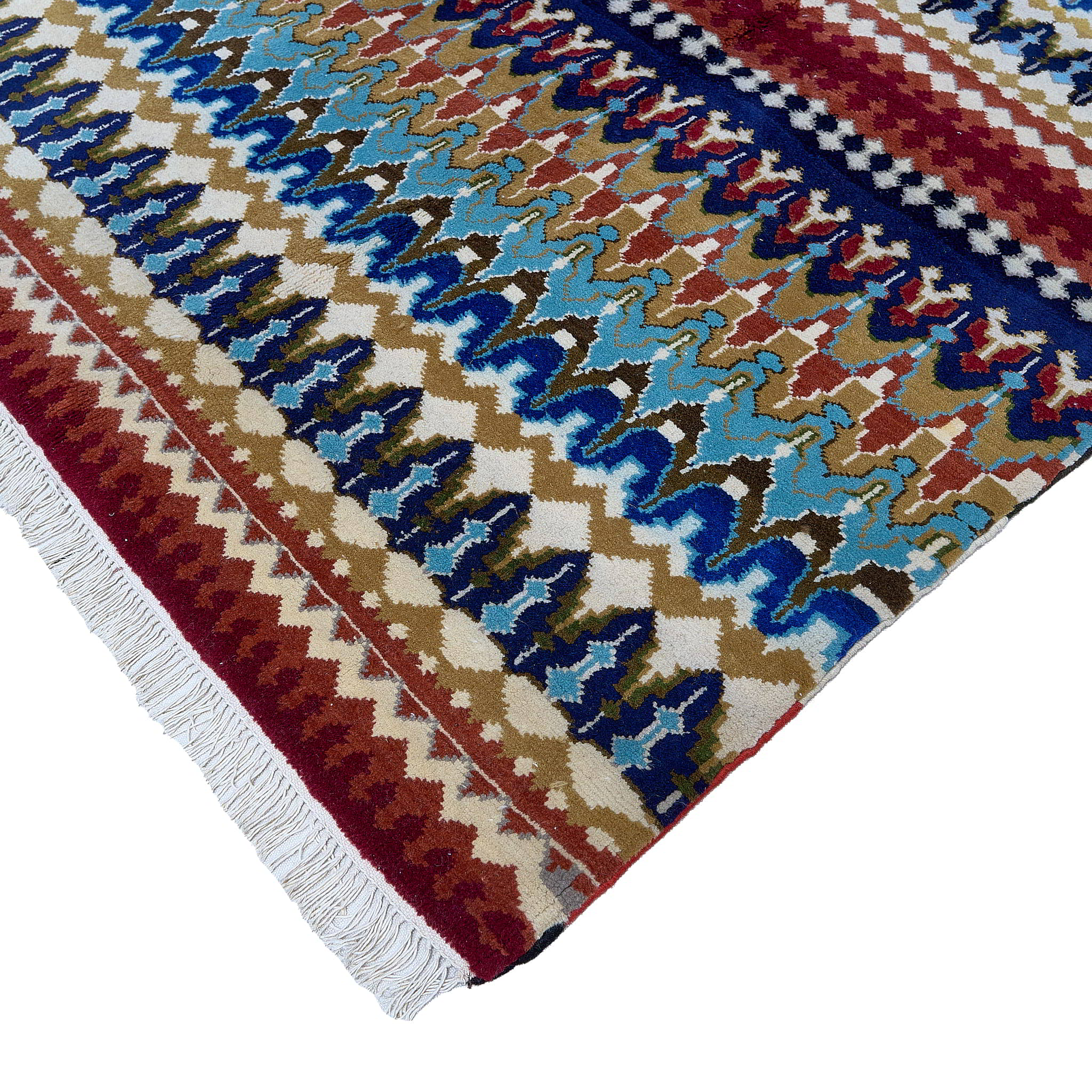 rug in navy wool with tribal striped wave motif, demonstrating handwoven rug craftsmanship.