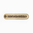 Wooden plaque with engraved text on a white background