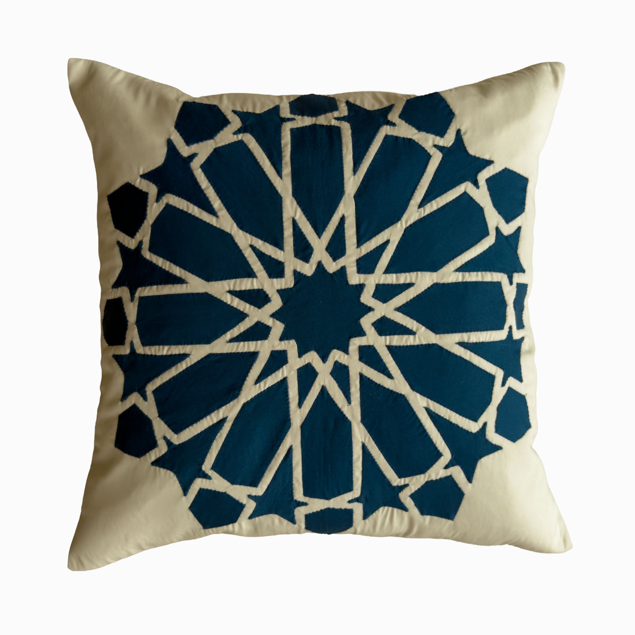 Cushion in petroleum polycotton with Najmi star geometry, demonstrating Khayamiya craftsmanship.