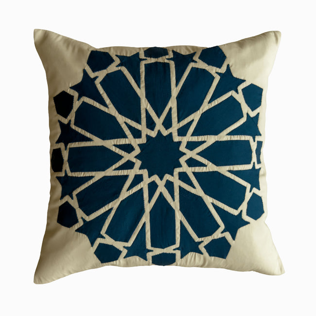 Cushion in petroleum polycotton with Najmi star geometry, demonstrating Khayamiya craftsmanship.