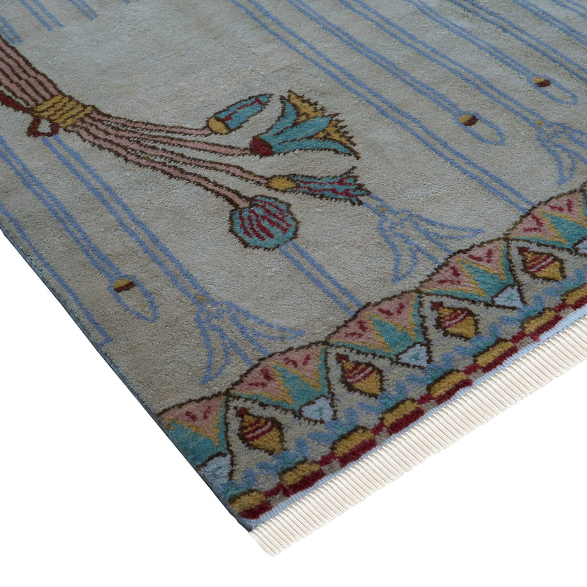 rug in brown wool with transitional floral motif, demonstrating handwoven rug craftsmanship.