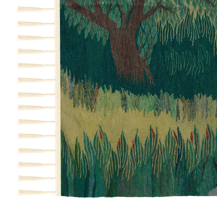 wall art in teal/green wool with nature landscape motif, demonstrating handwoven rug craftsmanship.