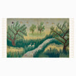 wall art in teal/green wool with nature landscape motif, demonstrating handwoven rug craftsmanship.