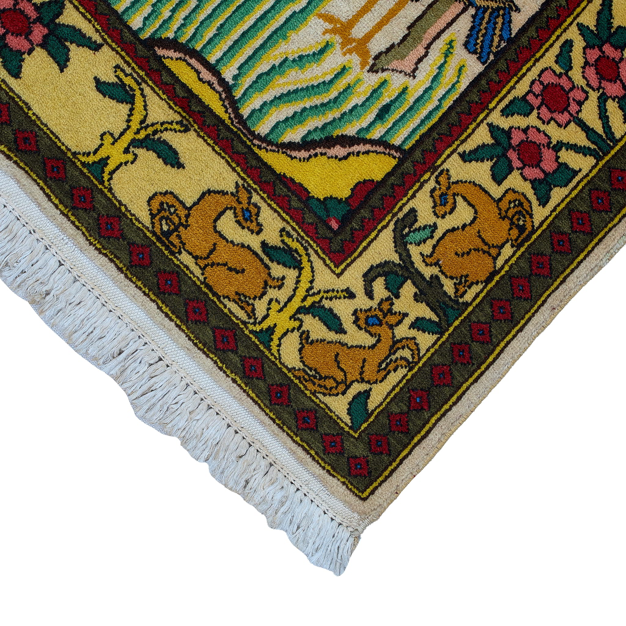 wall art in green wool with figurative village textile motif, demonstrating handwoven rug craftsmanship.