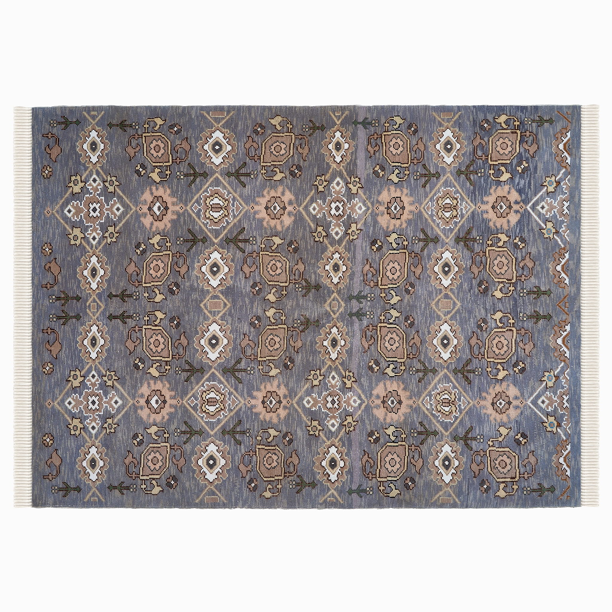 rug in slate grey wool with repeating diamond motif, demonstrating handwoven rug craftsmanship.