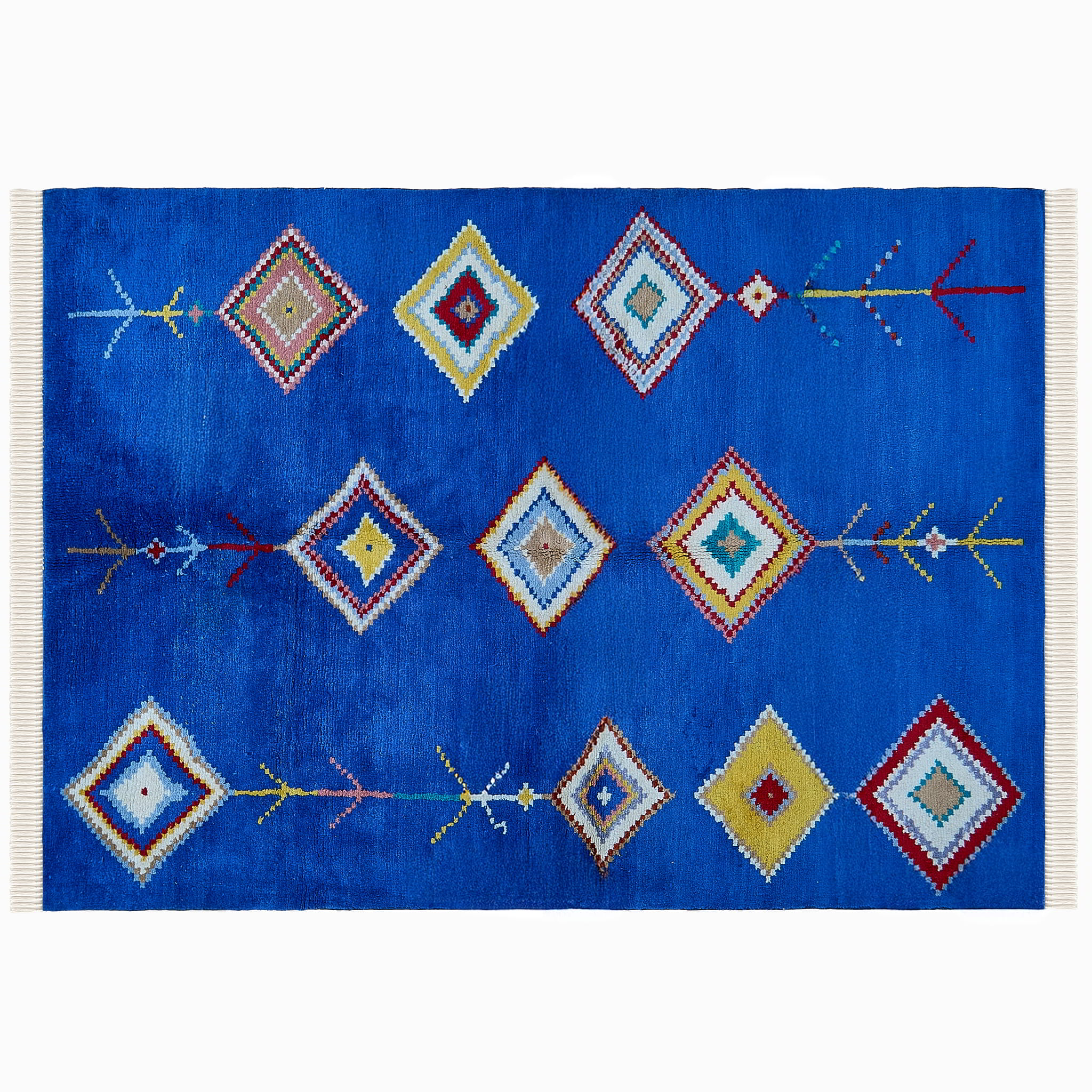 rug in vivid blue wool with tribal diamond motif, demonstrating handwoven rug craftsmanship.